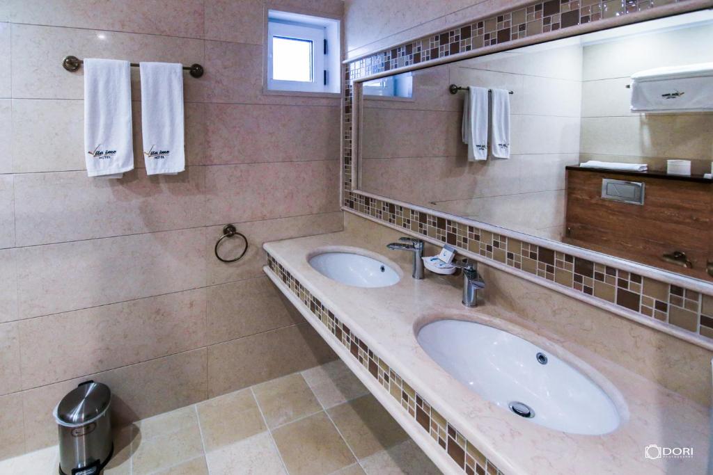 Koupelna v ubytování Hotel Restaurant Vila Ime Voskopoje