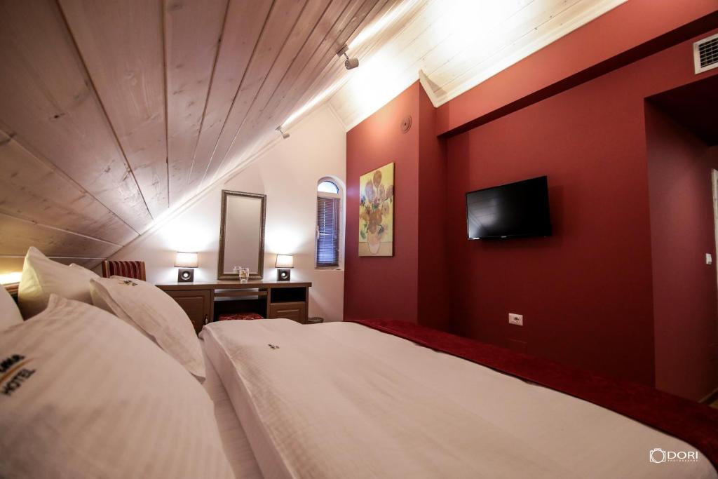 TV a/nebo společenská místnost v ubytování Hotel Restaurant Vila Ime Voskopoje