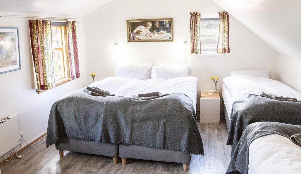 Letto o letti in una camera di Fossardalur Guesthouse