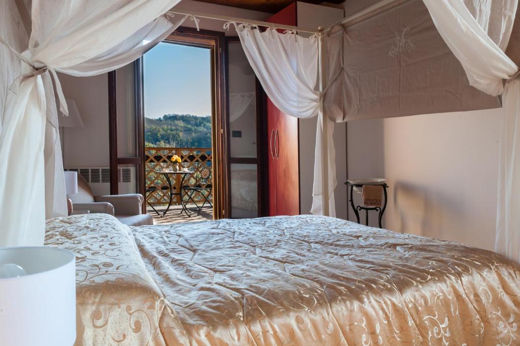 Pizzicalaluna Agriturismo Olistico sulle Colline di Pianoro - 带阳台的小型套房