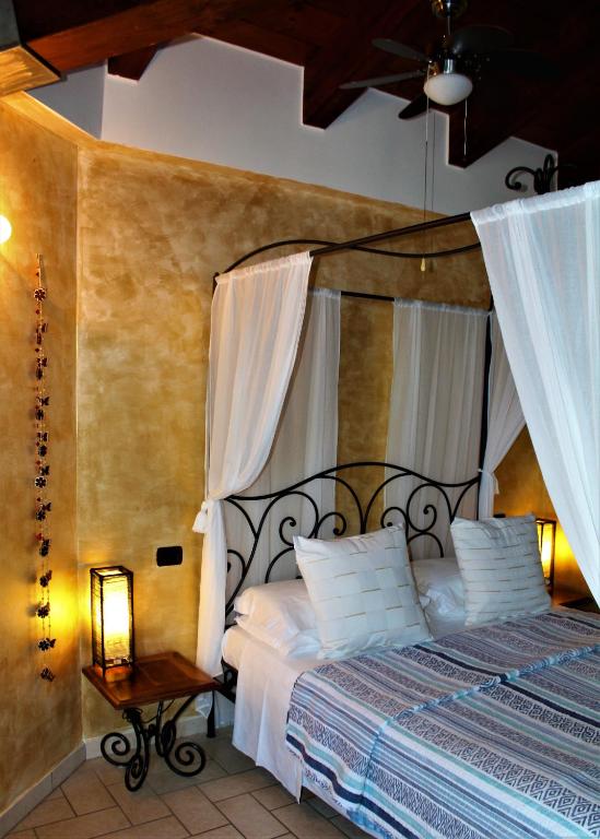 Postel nebo postele na pokoji v ubytování Antigua B&B