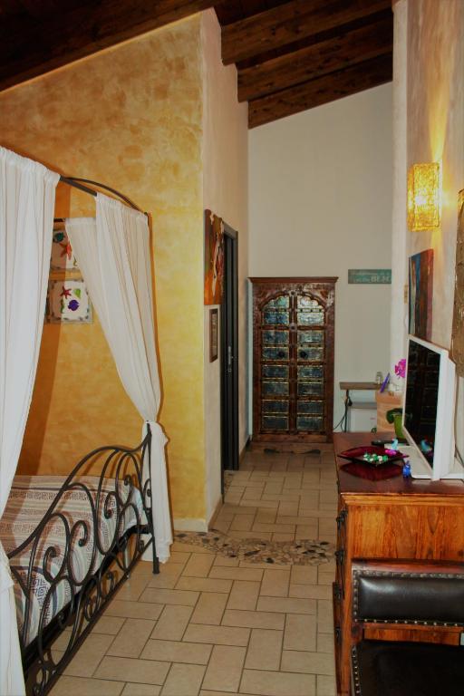Postel nebo postele na pokoji v ubytování Antigua B&B