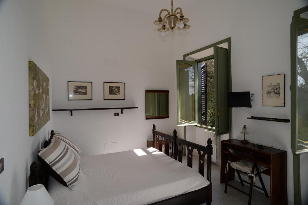 Postel nebo postele na pokoji v ubytování Vigna dell'Agrifoglio - Bed and Breakfast
