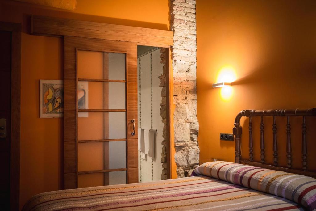Postel nebo postele na pokoji v ubytování A Corona del Reino