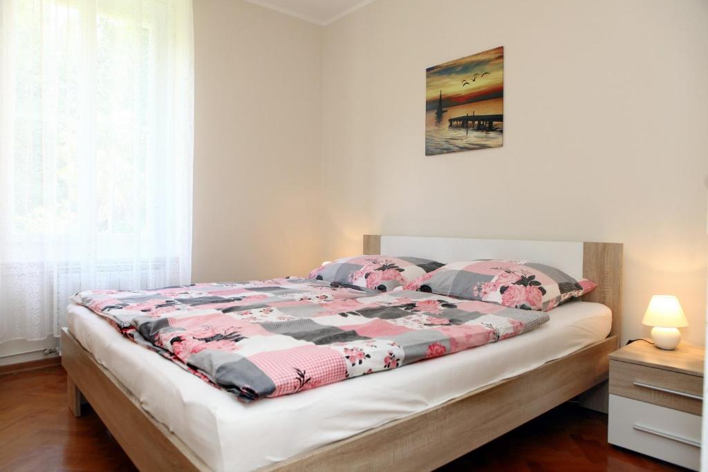 Кровать или кровати в номере Perfection in Portoroz SM1