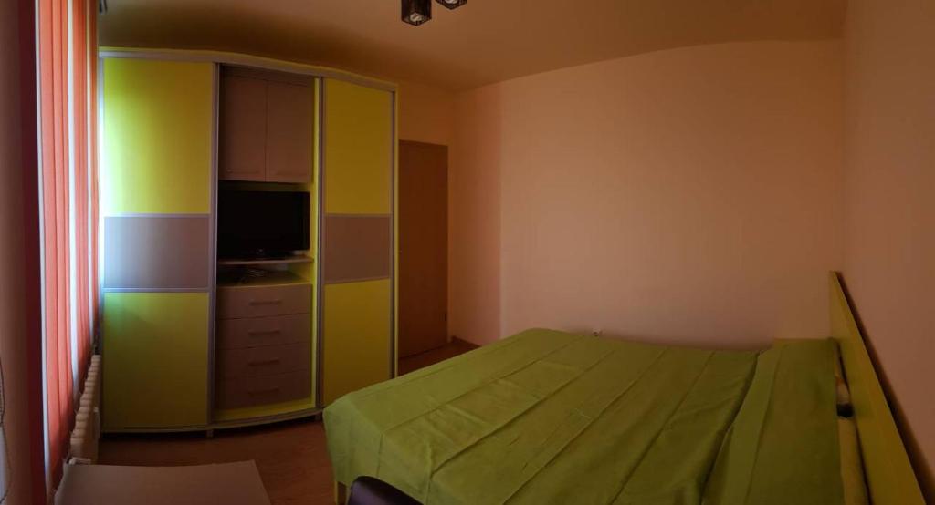 Apartament Raul tesisinde bir odada yatak veya yataklar