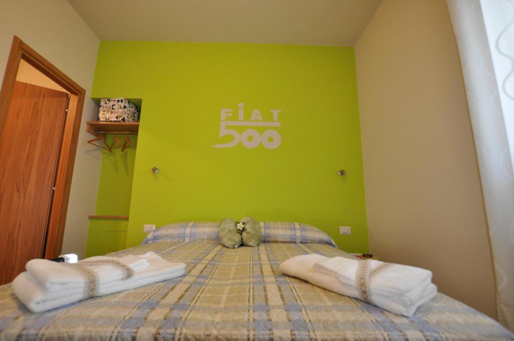 Postel nebo postele na pokoji v ubytování b&b la vecchia 500