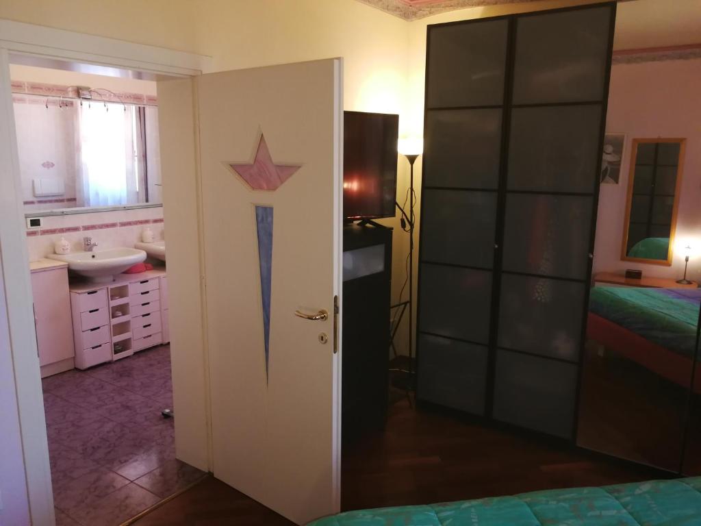 Łóżko lub łóżka w pokoju w obiekcie Vacanze Verde Mare - Beggi
