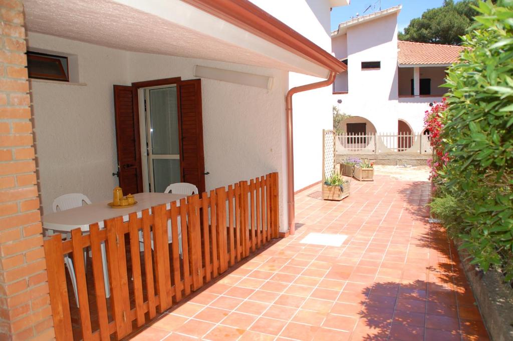 Lucia Holiday House a Porto Pino - Casa vacanze con BBQ