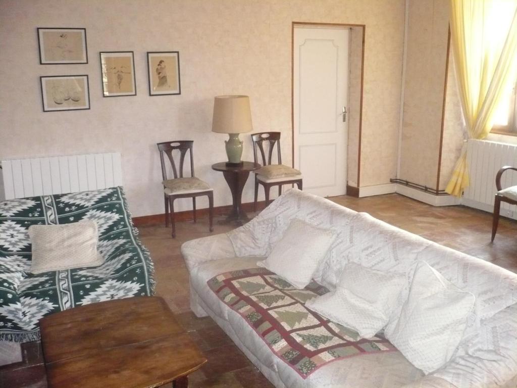 Postel nebo postele na pokoji v ubytování Les Convertigues