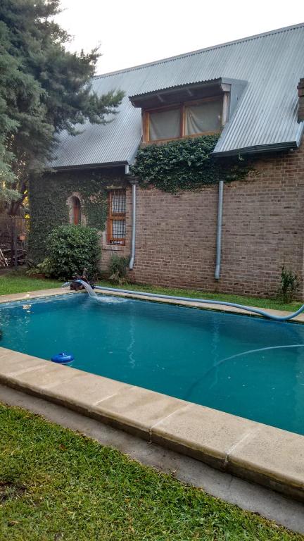 Bazén v ubytování La casa de Hostal del Sol nebo v jeho okolí