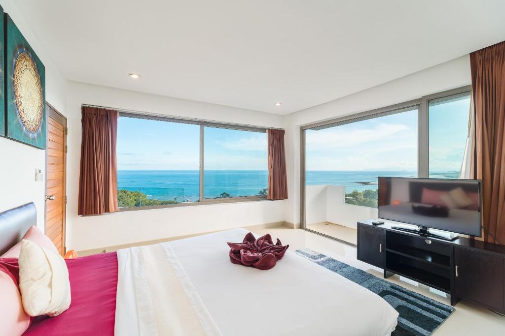 TV a/nebo společenská místnost v ubytování Tropical Sea View Residence
