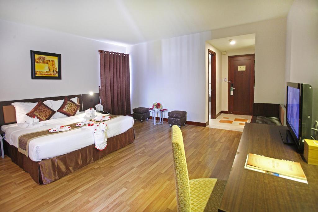 Postel nebo postele na pokoji v ubytování Park View Hotel