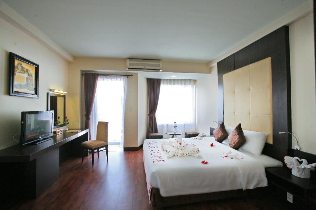 Postel nebo postele na pokoji v ubytování Park View Hotel