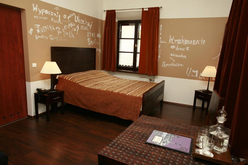 Posteľ alebo postele v izbe v ubytovaní Castle Inn