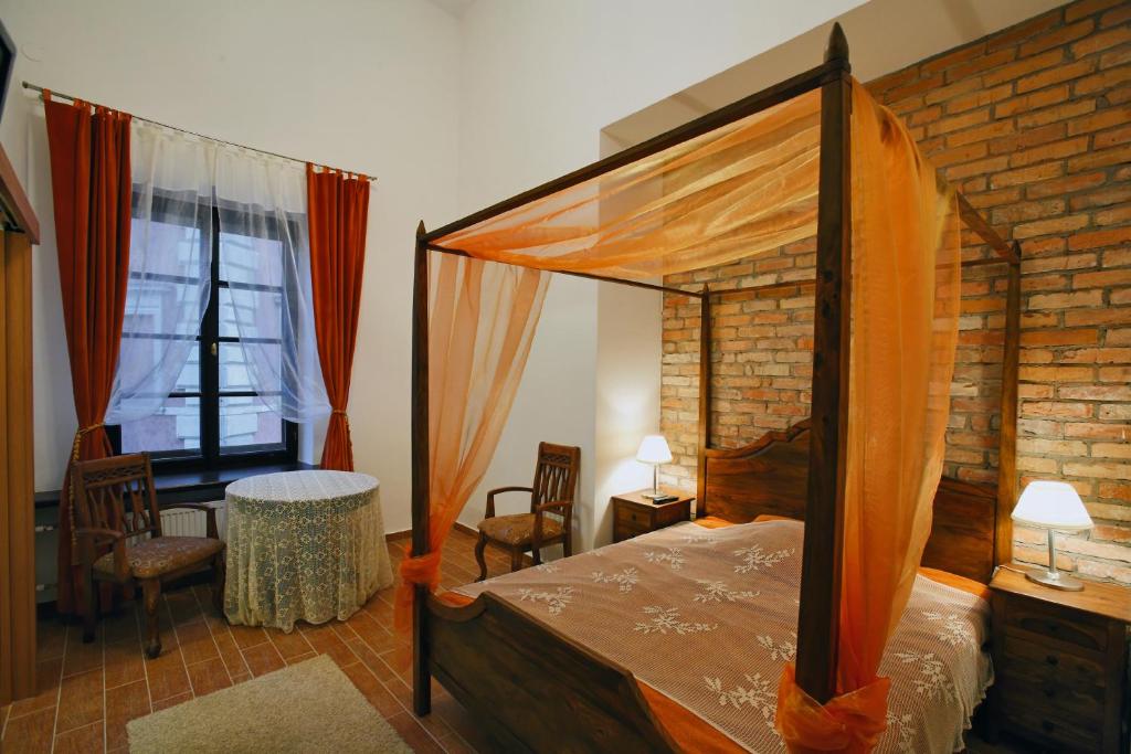 Posteľ alebo postele v izbe v ubytovaní Castle Inn