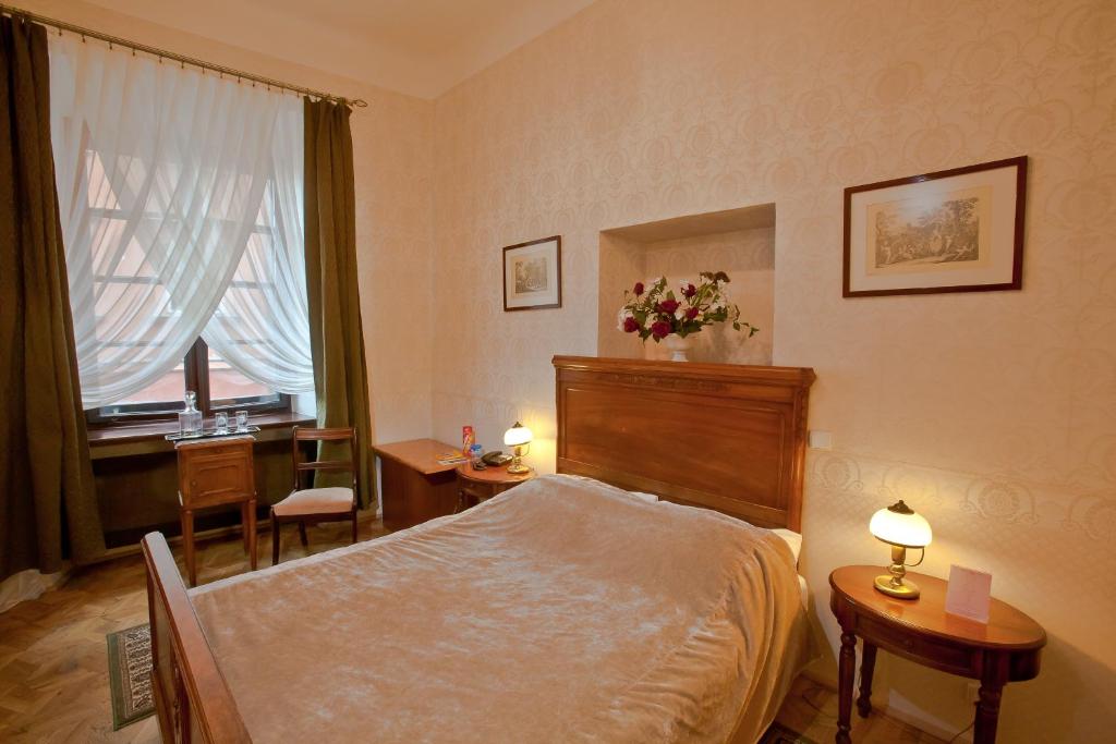 Posteľ alebo postele v izbe v ubytovaní Castle Inn