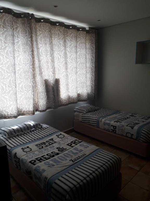 Postel nebo postele na pokoji v ubytování Seaboard Hotel & Holiday Apartments