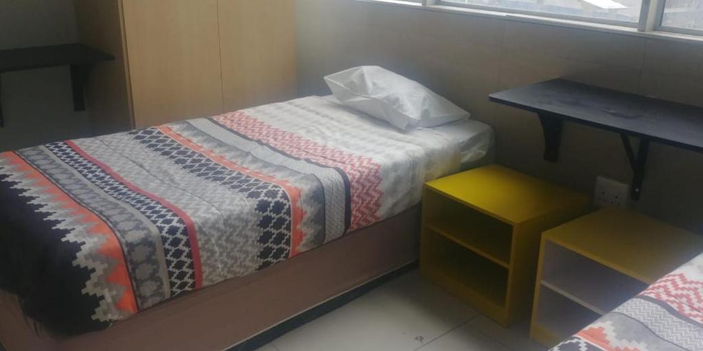 Postel nebo postele na pokoji v ubytování Seaboard Hotel & Holiday Apartments