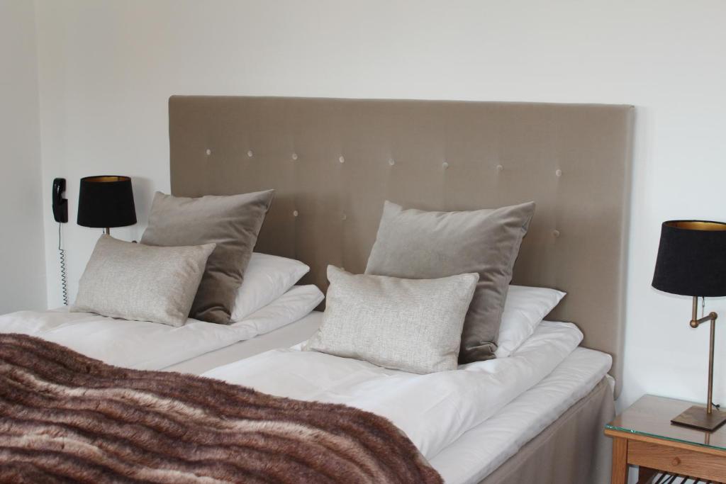 Postel nebo postele na pokoji v ubytování Green Hotel