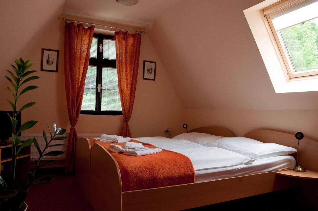 Postel nebo postele na pokoji v ubytování Hotel Paradies
