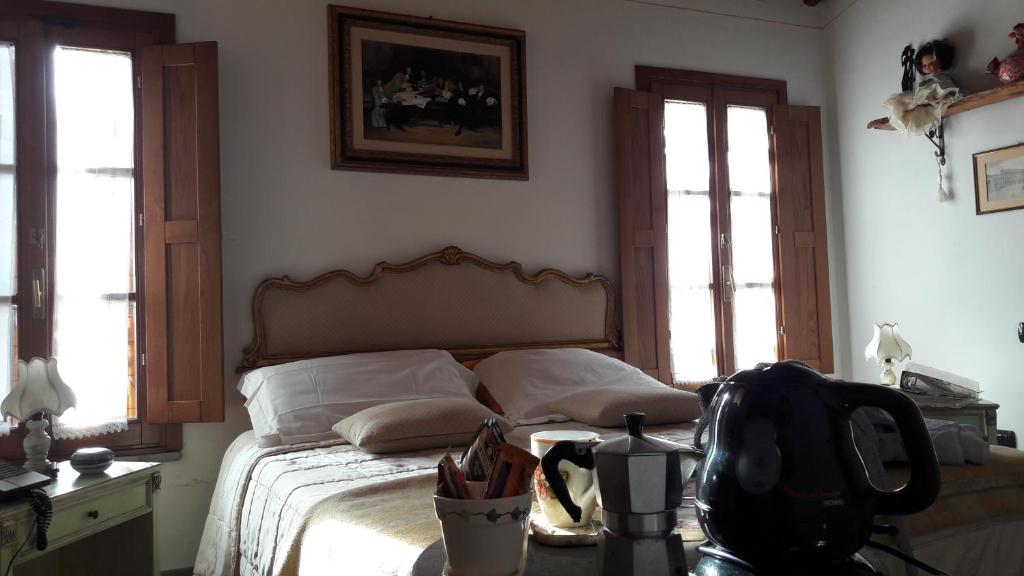 Łóżko lub łóżka w pokoju w obiekcie B&B il Fienile di Scarperia