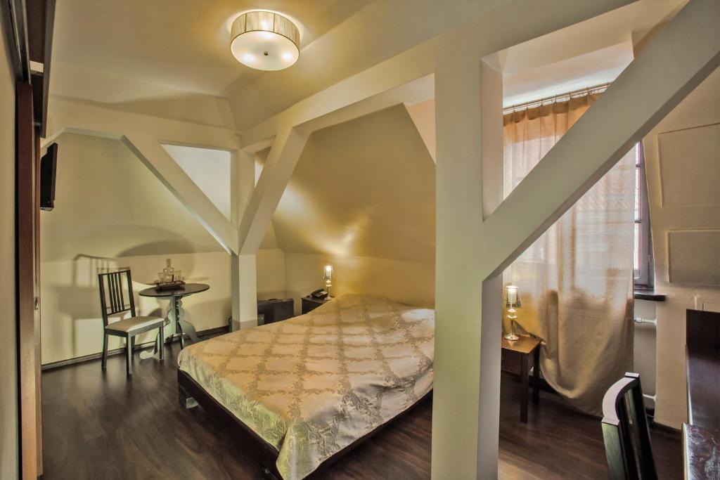 Posteľ alebo postele v izbe v ubytovaní Castle Inn