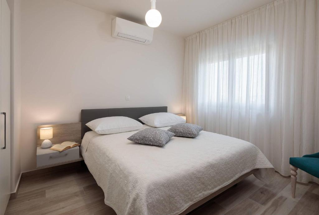 Posteľ alebo postele v izbe v ubytovaní Villa Castello
