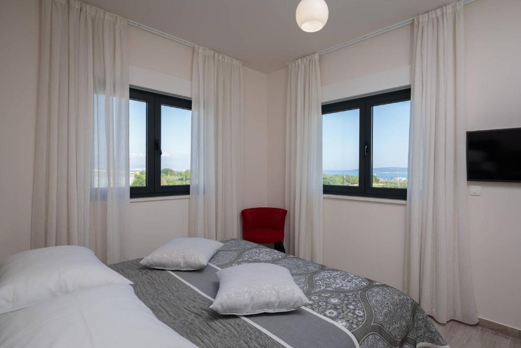 Posteľ alebo postele v izbe v ubytovaní Villa Castello