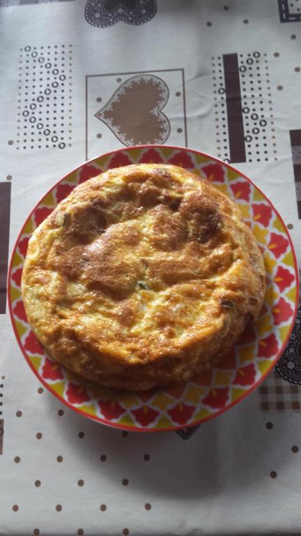 a pie sitting on a plate on a table at Villa Salvatore in San Leone