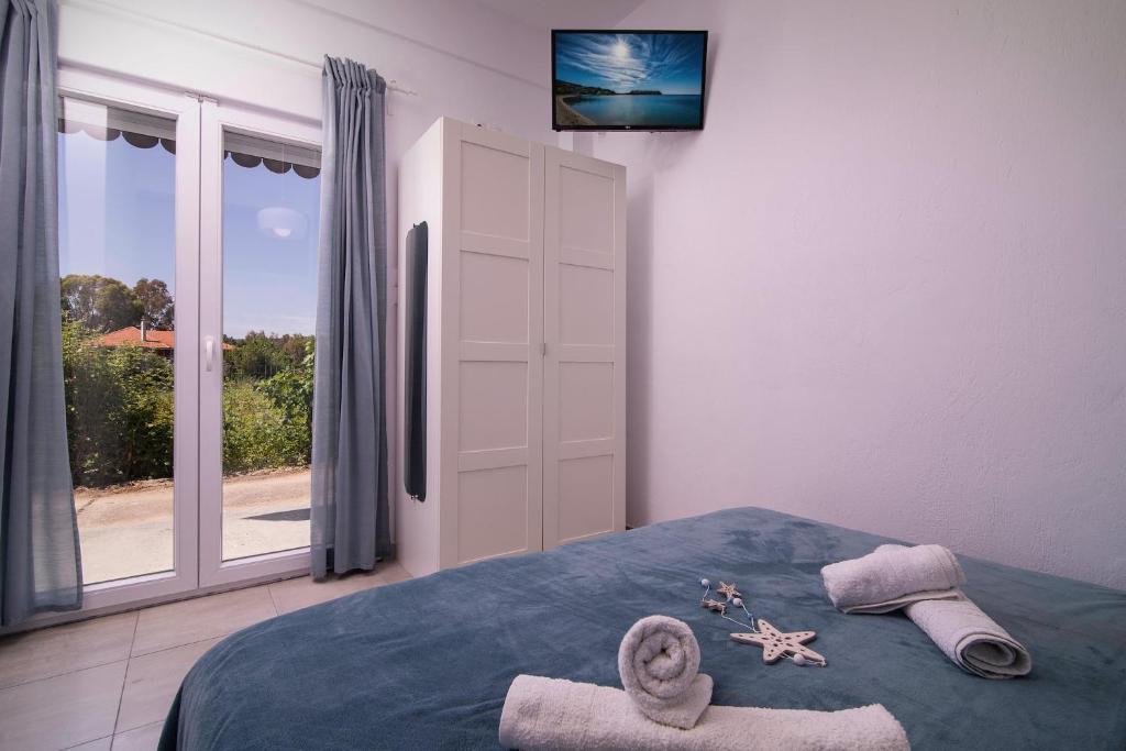 Postel nebo postele na pokoji v ubytování Acapus Studios