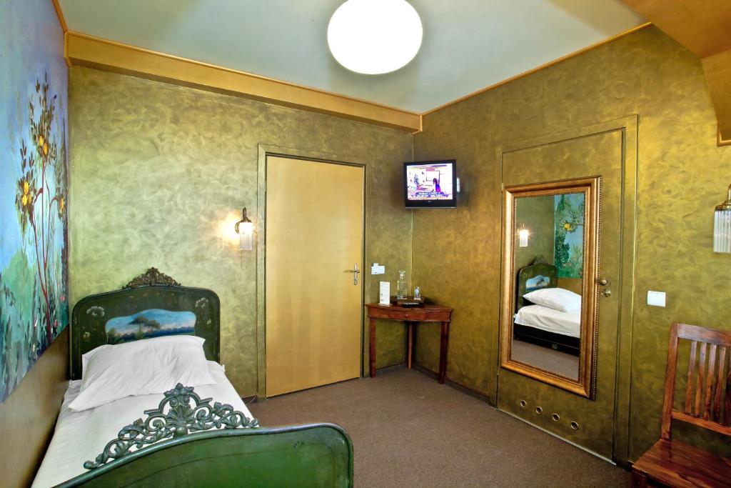 Posteľ alebo postele v izbe v ubytovaní Castle Inn