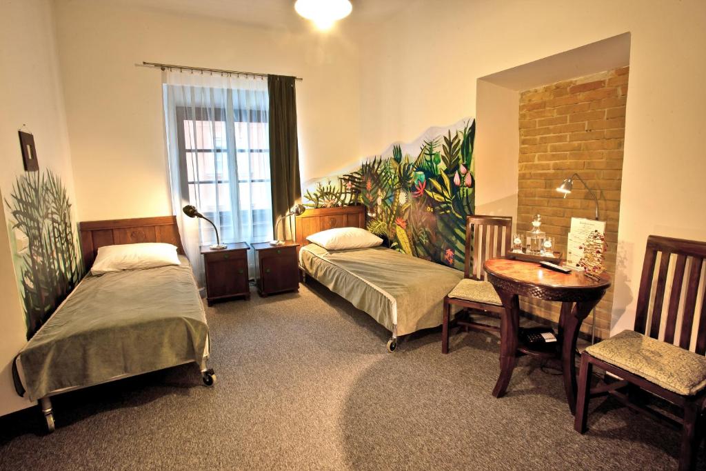 Posteľ alebo postele v izbe v ubytovaní Castle Inn