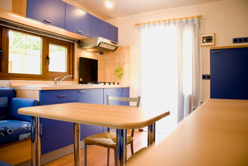 Kuchyň nebo kuchyňský kout v ubytování Lido Camping Village