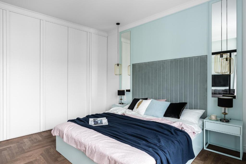 Posteľ alebo postele v izbe v ubytovaní Grand Apartments Wave- Na Fali