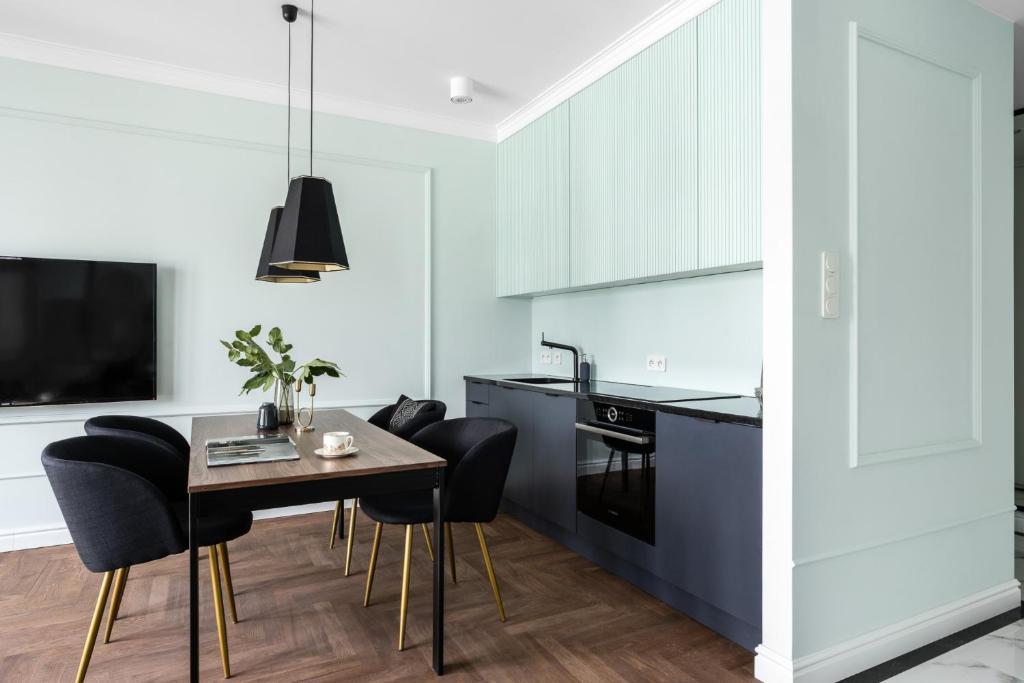 Kuchyňa alebo kuchynka v ubytovaní Grand Apartments Wave- Na Fali