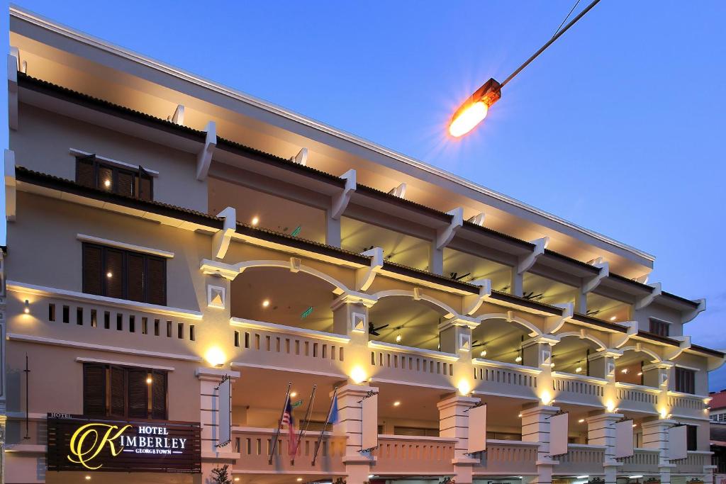 a hotel with a street light in front of it at Kimberley Hotel Georgetown in George Town