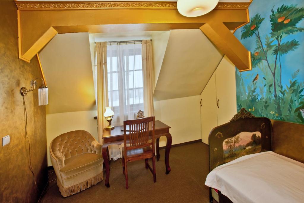 Posteľ alebo postele v izbe v ubytovaní Castle Inn