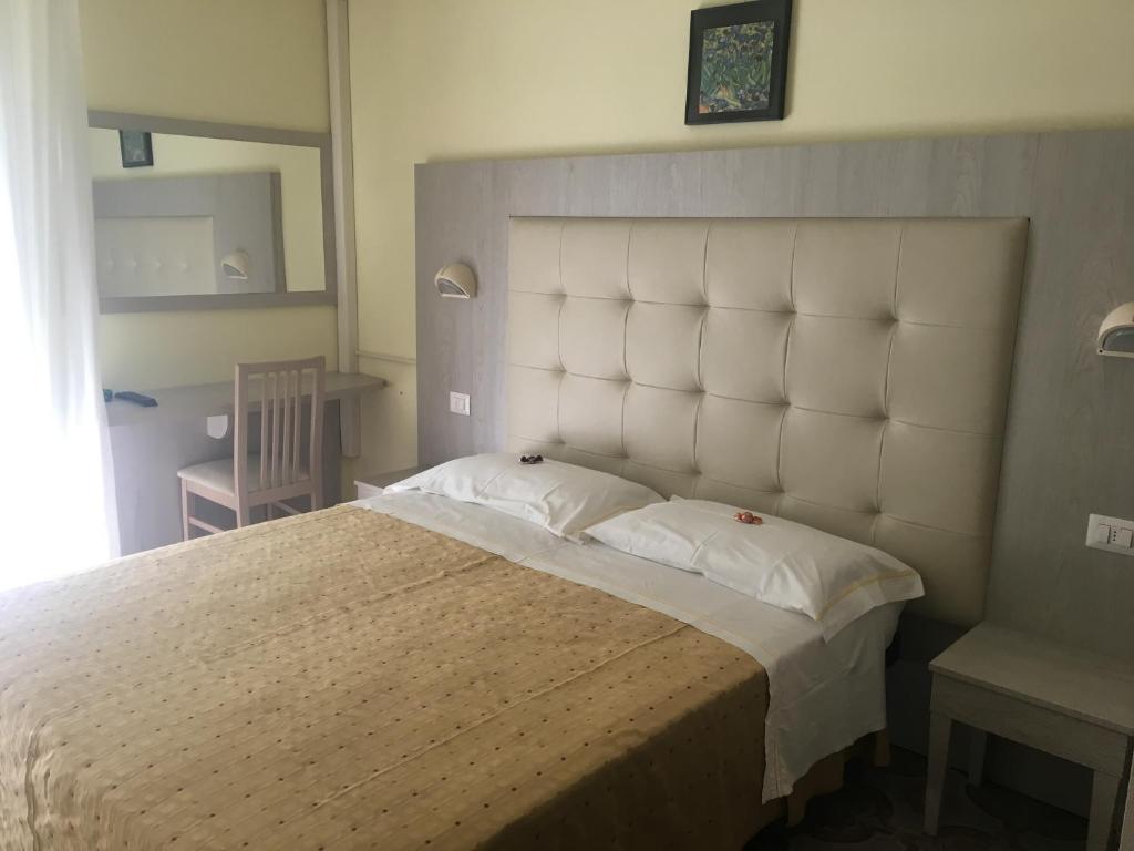 Postel nebo postele na pokoji v ubytování Hotel Laila