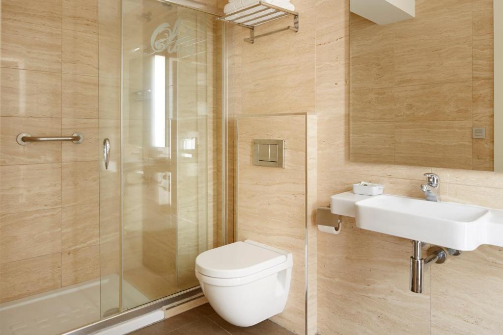 Koupelna v ubytování Hotel Olatu