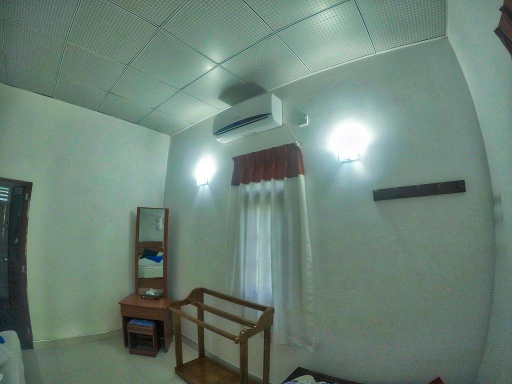 TV a/nebo společenská místnost v ubytování The Otunna Guest House Sigiriya