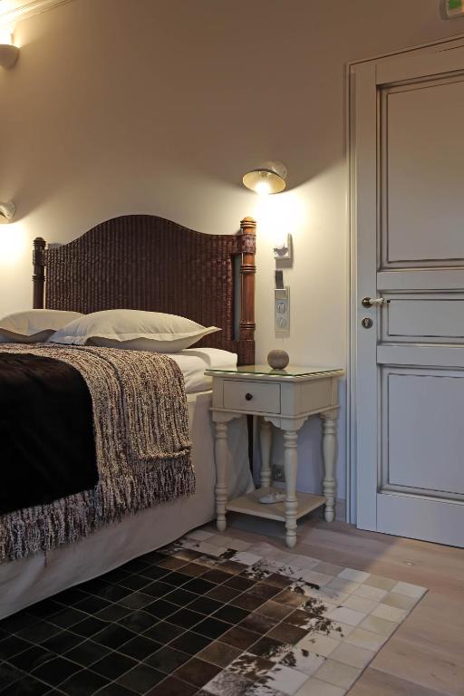 Postel nebo postele na pokoji v ubytování Hotel Doltso