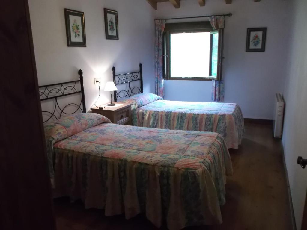 Posteľ alebo postele v izbe v ubytovaní Apartamento San Mamés