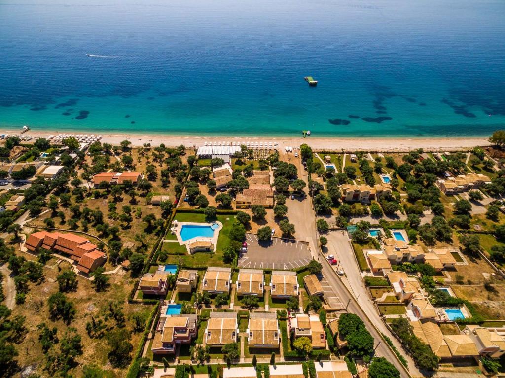 an aerial view of a resort near the beach at Akti Barbati Houses by Konnect in Barbati