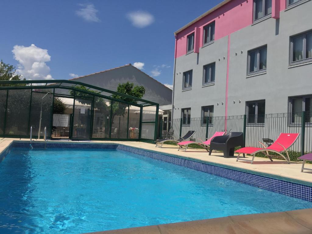 Bazén v ubytování Kyriad Montpellier Aéroport - Parc Expo nebo v jeho okolí