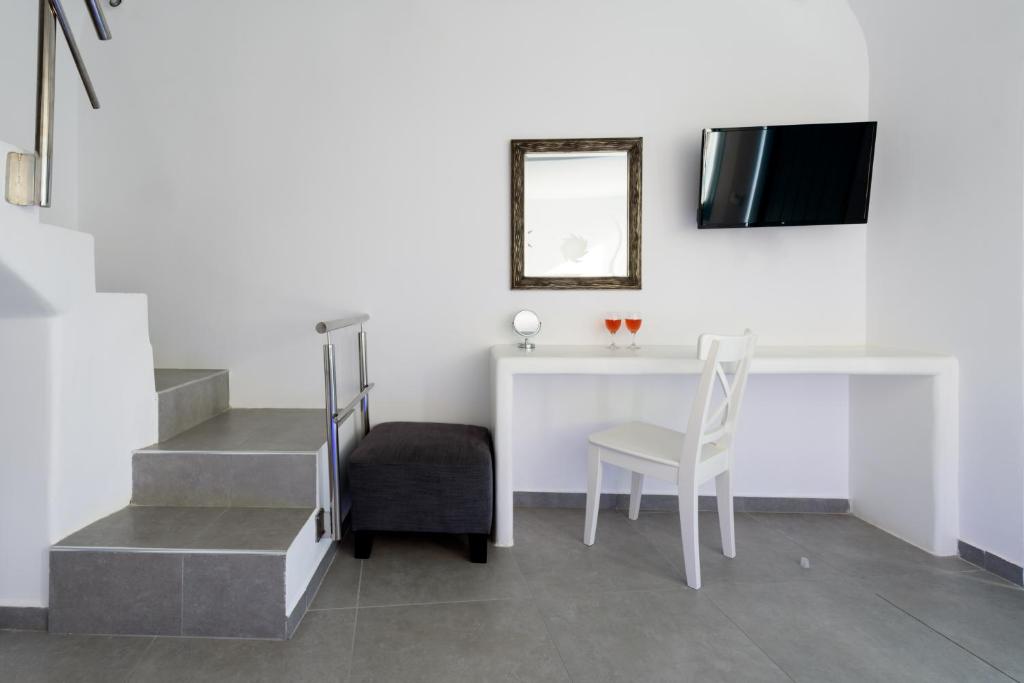 TV a/nebo společenská místnost v ubytování Nikolas Hotel