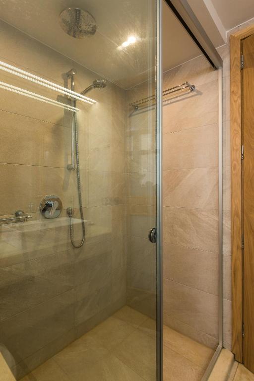 Kúpeľňa v ubytovaní Ammos Suites