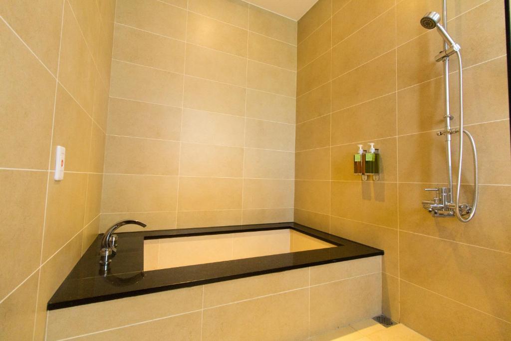 Koupelna v ubytování Qi Li Xiang Homestay
