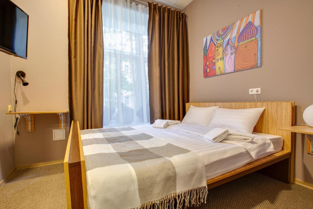 Кровать или кровати в номере Axel Hostel