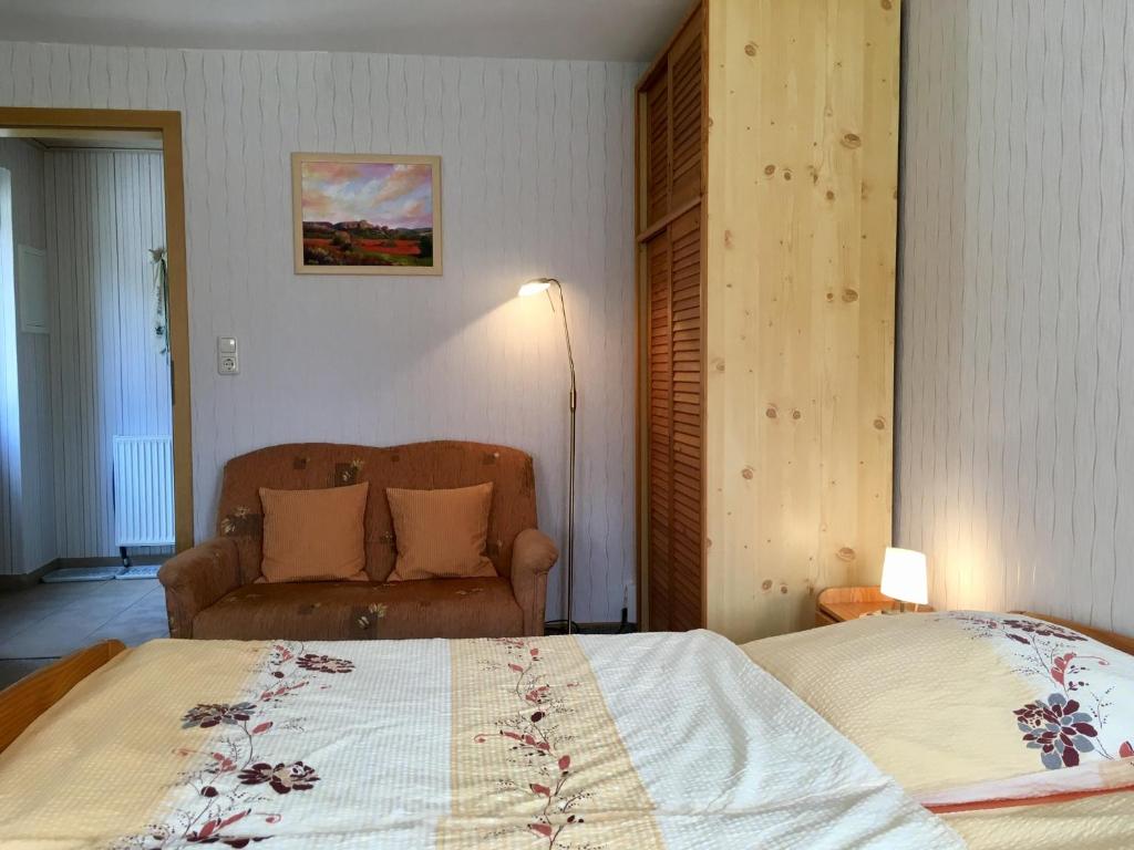 Postel nebo postele na pokoji v ubytování Ferienwohnung Hänel